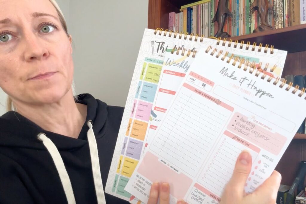 holding 3 planners from decorably