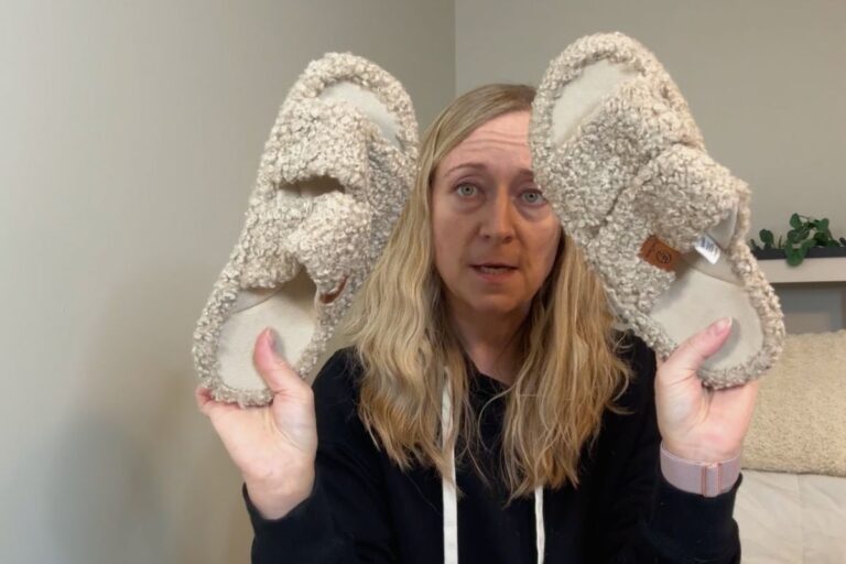 Jen holding Everfoams slipper sandals