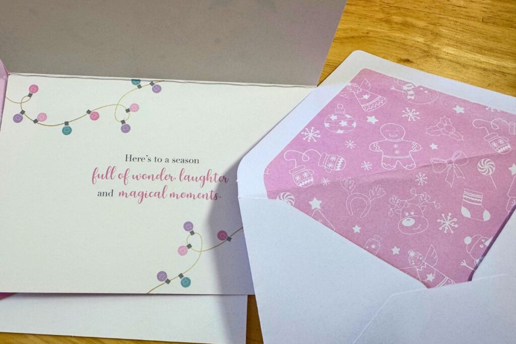 Inside of a holiday card and details on the envelope