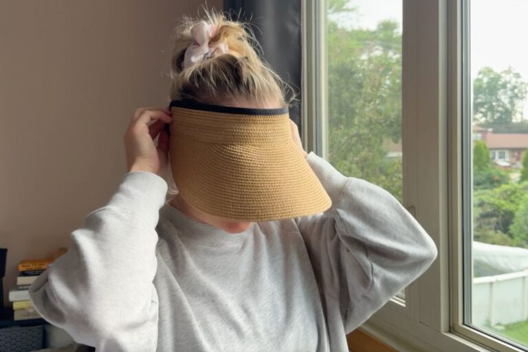 Shelley wearing a sun visor