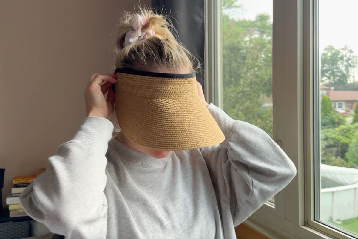 Shelley wearing a sun visor