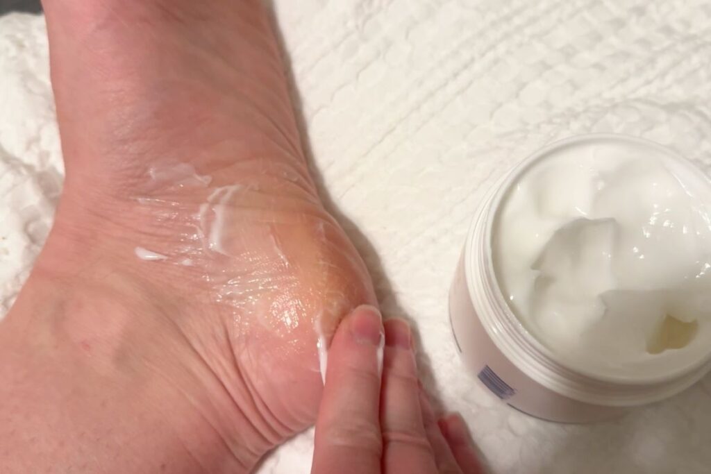 Rubbing foot cream on my foot