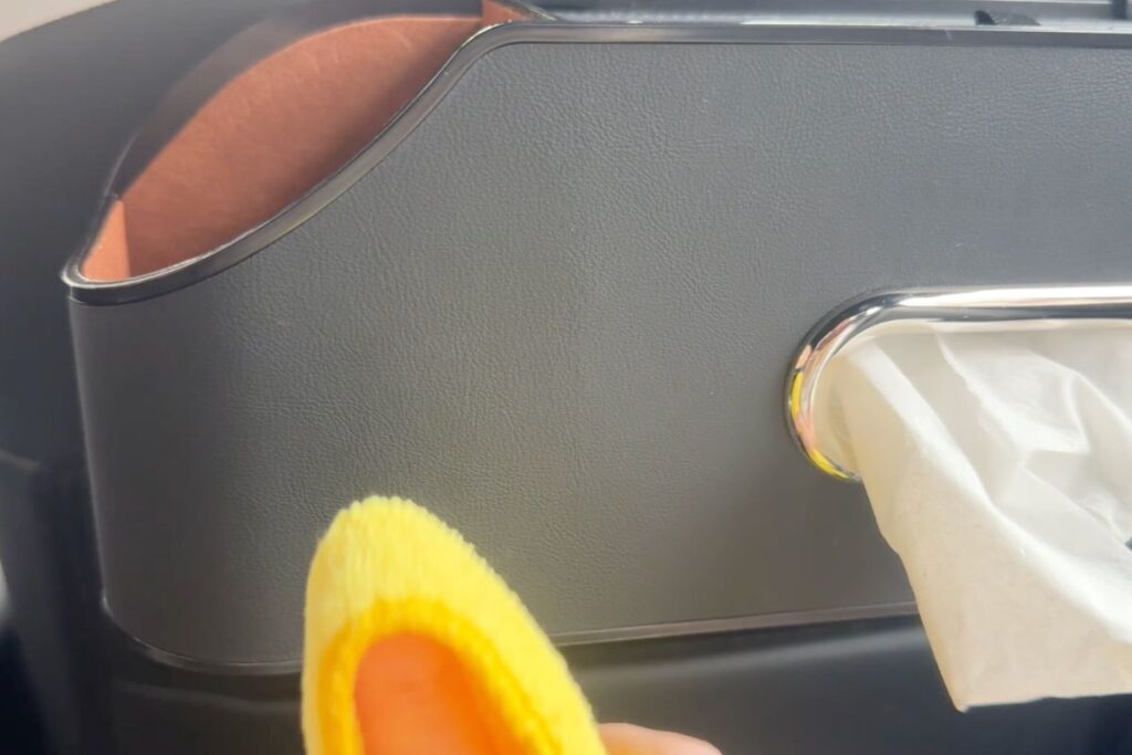 cleaning a spot from the car organizer