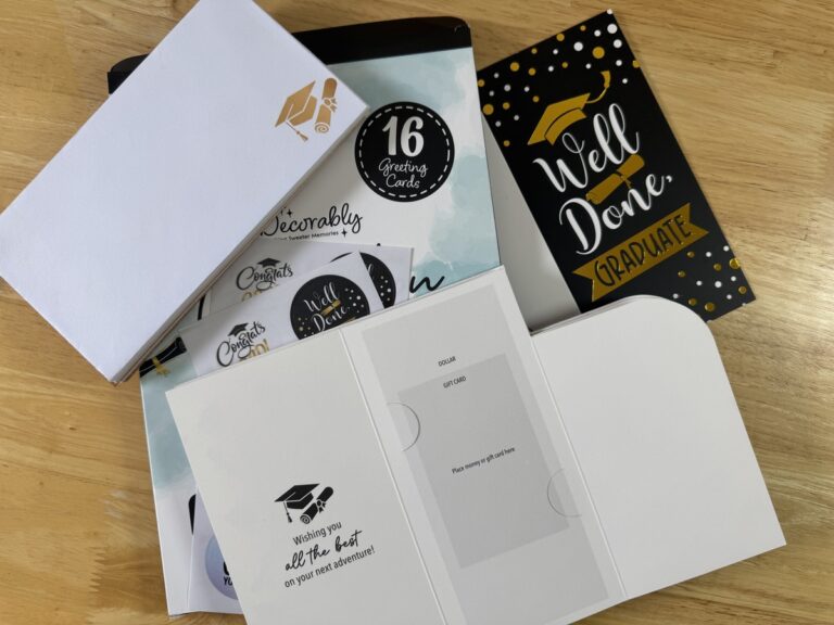Decorably 16-pack graduation card set with sample Well Done Graduate card and open card displayed