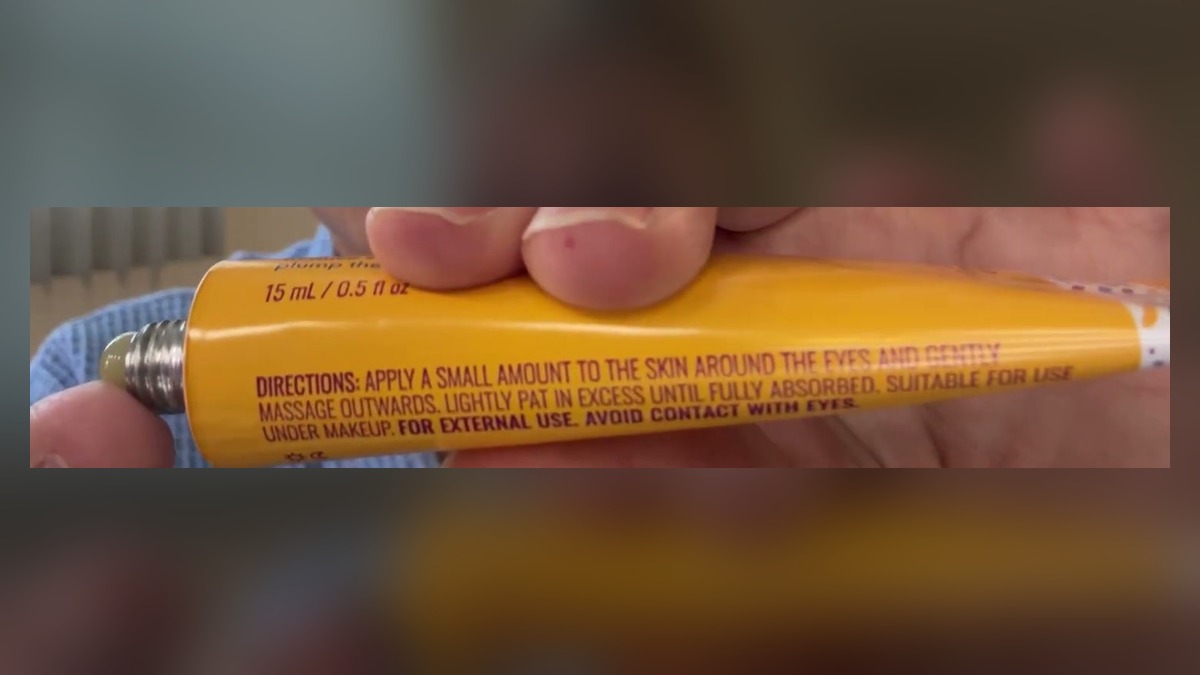 Yellow Good Molecules Yerba Mate eye gel tube held sideways, with the 15 mL size and directions printed on it and a dab of clear gel at the open tip