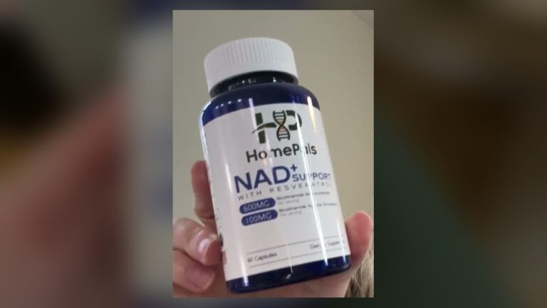 Blue HomePals NAD+ Support with Resveratrol bottle with a white cap, label showing 600 mg NMN and 100 mg NAD+ per serving, 60 capsules