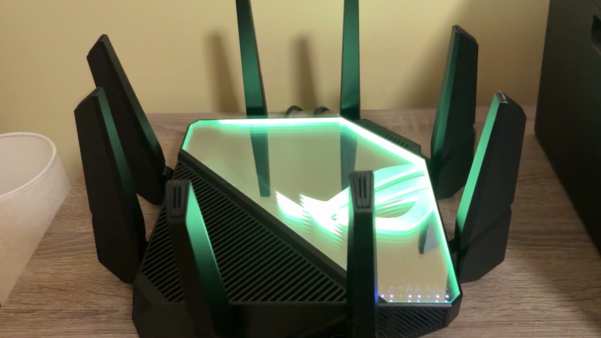 The same ASUS ROG Rapture router with its Aura RGB lighting switched to green