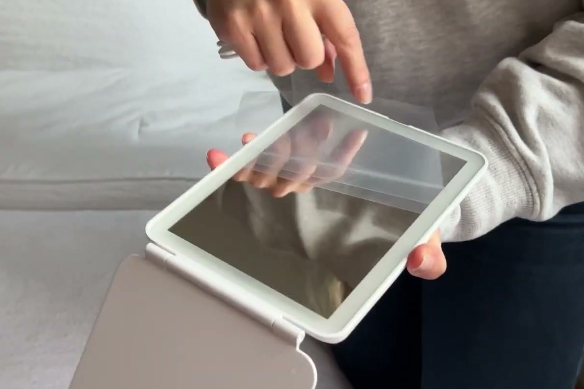 FUNTOUCH travel mirror opened on its stand with the clear protective film still on the glass
